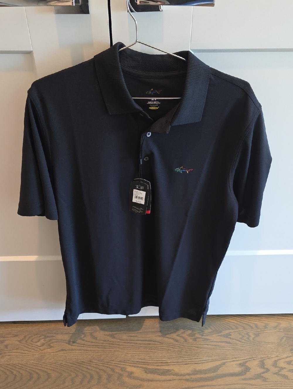 Greg Norman Perfomance Fabric Black Polo with Multicolor Shark Logo